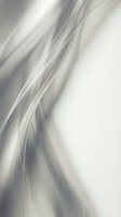 Smooth flowing waves of silver and white create an elegant abstract background with soft curves and gentle motion, suitable for corporate presentations, web design, and modern marketing materials.