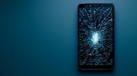 Shattered smartphone screen with dramatic blue lighting effect on dark background, displaying cracked glass pattern radiating from impact point.