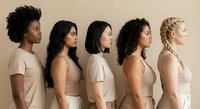 Five diverse women in profile view wearing neutral beige clothing, representing multicultural beauty and unity in minimalist studio setting.