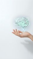 Hand holding glowing holographic brain model representing artificial intelligence, mental health, neuroscience and cognitive technology concepts.