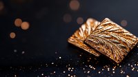 Luxury golden chocolate bar with elegant embossed pattern on dark surface with warm bokeh lights and scattered cocoa powder creating premium confectionery atmosphere.
