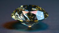 Brilliant cut diamond with yellow tint on dark surface showing facets, clarity and light dispersion in dramatic lighting, macro photography closeup.