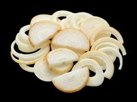 Fresh sliced white onion rings isolated on transparent background, ready for food design, restaurant menus, recipe cards, stickers, print on demand, and culinary clipart use.