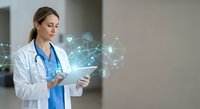 Female doctor using digital tablet with futuristic medical network connections and data visualization in modern healthcare setting for telemedicine applications.