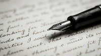 Fountain pen with metal nib resting on handwritten manuscript page with cursive script text, suitable for writing, literature, education, and vintage stationery concepts.