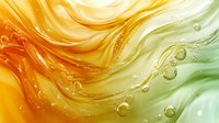 Flowing liquid waves in orange, yellow and green gradient colors with transparent bubbles creating dynamic abstract background pattern.
