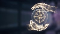 Glowing compass rose protected by cupped hands symbolizing guidance, direction and navigation in business strategy and decision making.