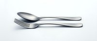 Stainless steel spoon and fork set isolated on white background for kitchen utensils, dining, restaurant, culinary design projects and food service.