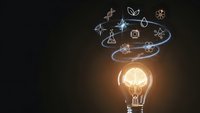 Glowing light bulb with swirling science icons including atoms, DNA, molecules and gears representing innovation, creativity and scientific discovery concepts.