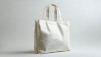 Natural cotton canvas tote bag with handles isolated on white background for eco-friendly shopping and sustainable lifestyle branding mockup.