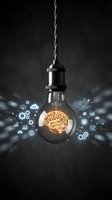 Vintage light bulb with glowing brain filament surrounded by technology icons representing artificial intelligence and innovation concepts.
