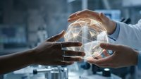 Business hands protecting glowing network sphere symbolizing global connectivity, teamwork and digital transformation in modern office environment.