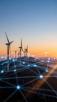 Wind turbines with digital network connections at sunset representing renewable energy and smart grid technology for sustainable power generation.