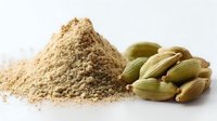 Aromatic cardamom powder and whole green pods on white background, essential spice for culinary use in baking and savory dishes.