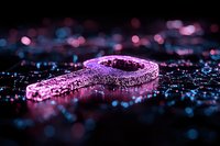 Glittering pink key covered in sparkles against dark background with colorful bokeh lights creating magical atmosphere. Concept of success and opportunity.