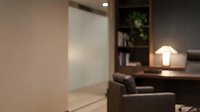 Modern minimalist living room interior with warm lighting and contemporary furniture for home design and decoration projects.