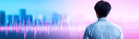 Young Asian businessman in light blue shirt analyzing colorful digital audio waveform data visualization against futuristic city skyline background.