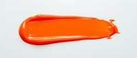 Vibrant orange paint stroke or brushstroke on white background, suitable for graphic design, web design, and creative projects.