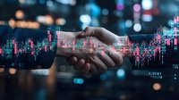 Business handshake with financial data overlay representing partnership success in trading and investment markets with bokeh city lights background.