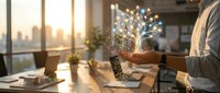 Businessman holding glowing digital tree with particles flowing from hands in modern office with city skyline at sunset, representing growth, innovation, and sustainable business development.