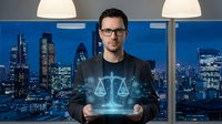 Professional male lawyer holding digital justice scales hologram in modern office with city skyline at night. Legal technology concept for law firms.