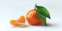 Fresh mandarin with green leaf and peeled segment on white background, showcasing bright orange citrus fruit for food photography.