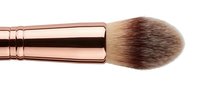 Luxury rose gold makeup brush with soft bristles isolated on white background for cosmetic application and beauty routine.