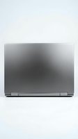 Closed silver laptop with metallic finish displayed from rear view on white background, isolated for web design, marketing materials, and technology product presentations.