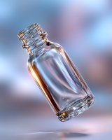 Empty glass bottle floating in air against blurred blue and pink background, with dramatic lighting creating reflective and transparent effects.