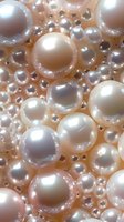 Lustrous pearl spheres in various sizes clustered together on soft peach background, creating elegant jewelry or luxury cosmetic concept.