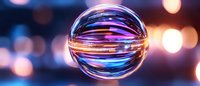 Crystal glass sphere reflecting colorful bokeh lights against dark blue background with glowing orange and purple illumination creates magical atmosphere.