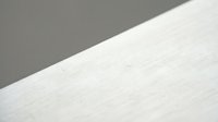Clean white textured paper surface with subtle fiber pattern and soft shadow, minimalist background for design projects and presentations.