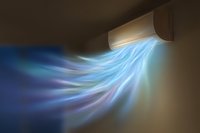 Air conditioner unit blowing cool multicolored air stream with flowing dynamic effect showing temperature control and climate comfort in home interior.
