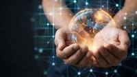 Hands holding glowing digital globe with network connections and data visualization, representing global technology, internet connectivity, and worldwide business communication.