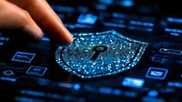 Digital security shield glowing in blue neon light on dark background with finger touching virtual protection interface, representing cybersecurity concept.