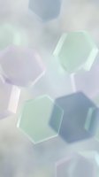 Translucent hexagonal shapes in soft pastel tones of pink, mint green, and blue arranged on a blurred neutral background. Isolated geometric forms suitable for web design, presentations, and digital graphics.