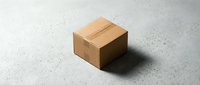 Closed cardboard box with tape on concrete surface, isolated on white background for packaging, shipping, delivery, and logistics design projects.