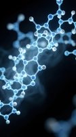Blue molecular structure with connected atoms and bonds on dark background for scientific research and chemistry education presentations.