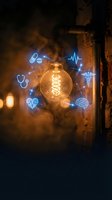 Vintage lightbulb surrounded by glowing medical icons including stethoscope, pills, heartbeat, brain and caduceus symbol representing healthcare innovation.