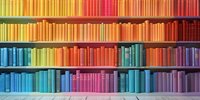 Colorful rainbow bookshelf arrangement with books organized by color spectrum from yellow through orange, blue, and pink on wooden shelves against wall.