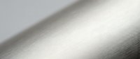 Brushed metal surface with smooth linear texture and reflective finish for modern industrial design backgrounds and luxury product presentations.