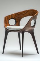 Modern curved wooden armchair with circular cutouts and gray cushion seat, featuring walnut veneer backrest and black legs. Elegant furniture design on light background.