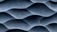 Monochromatic wavy pattern with textured surface creates abstract flowing lines and curves in shades of blue and gray, suitable for modern architectural backgrounds.