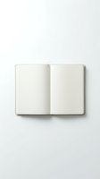 Open blank notebook with empty pages on white background for writing, journaling, planning and creative projects.