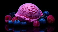 Pink berry ice cream scoop surrounded by fresh blueberries, raspberries and blackberries on reflective black surface with dramatic lighting and vibrant colors.