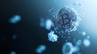 Glowing cryptocurrency Bitcoin symbol surrounded by digital particles and bokeh effects on dark blue background, modern financial technology concept.