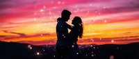 Silhouetted couple embracing against vibrant sunset sky with golden and pink hues, surrounded by glowing light particles, perfect for romance and love-themed designs.