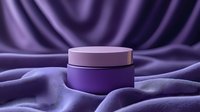 Purple cosmetic jar on luxurious silk fabric background with soft folds and dramatic lighting creates elegant product presentation for beauty and skincare marketing.