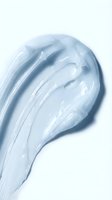 Creamy light blue skincare product swatch with smooth texture isolated on white background, suitable for cosmetics, beauty, and skincare packaging design.