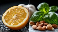 Fresh orange half with almonds and basil leaves on dark background, water drops on citrus. Natural ingredients for healthy Mediterranean cooking.